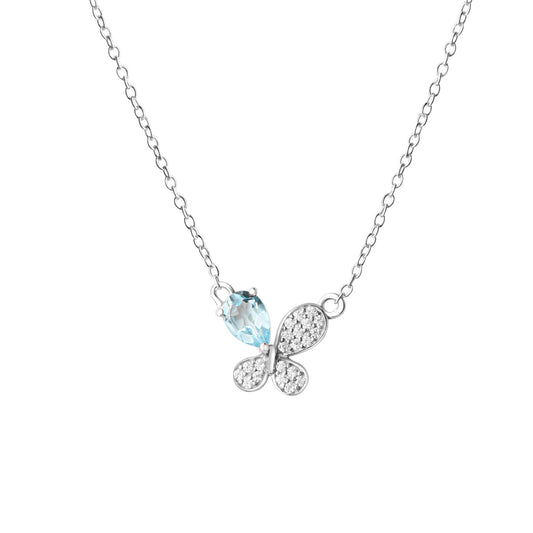 925/- Sterling silver rhodium plated blue topaz and zirconia